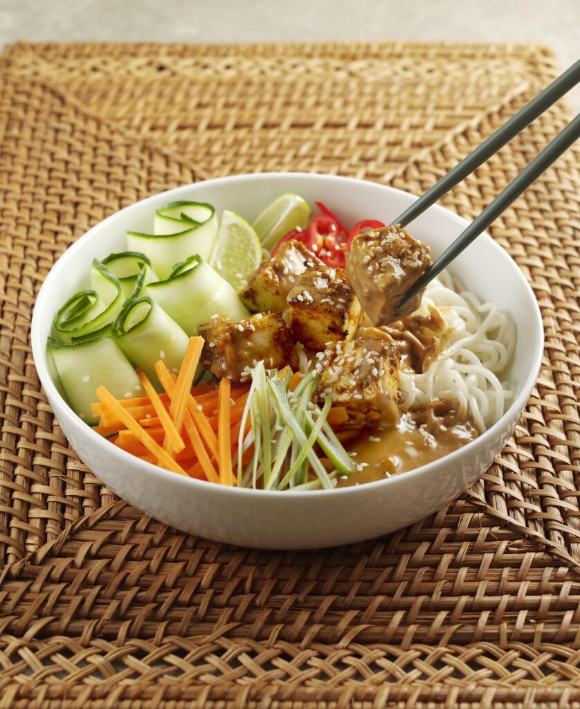 Satay paneer bowl with chopsticks